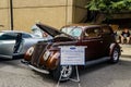 A Brown 1937 Ford Two Door Sedan with a Flat Back