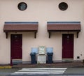 Brown Front Doors with Small Square Decorative Windows on a Paris Suburb Street