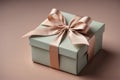 Brown gift box with pink satin bow on blue background. Royalty Free Stock Photo