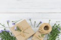 Brown gift boxes with purple cutter flowers bouquet Royalty Free Stock Photo