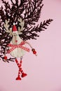 Brown gilded branch and deer in santa hat on a pink background for Christmas blank Royalty Free Stock Photo