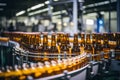 Brown glass beer bottles on brewery conveyor, modern production line for alcohol beverage manufacturing Royalty Free Stock Photo