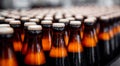 Brown glass beer drink alcohol bottles, brewery conveyor, production line