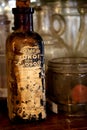 Brown Glass Distressed Bottle in an Antique Shop
