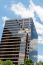 Brown Glass Office Tower Under Nice Skies Royalty Free Stock Photo