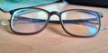 The brown glasses are sitting on the brown table Royalty Free Stock Photo