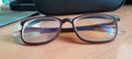 The brown glasses are sitting on the brown table Royalty Free Stock Photo