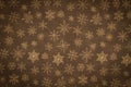 Brown and gold snowflake winter background Royalty Free Stock Photo