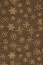 Brown and gold snowflake winter background Royalty Free Stock Photo