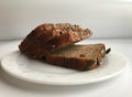 Brown grain bread on a light background Royalty Free Stock Photo