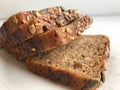 Brown grain bread on a light background Royalty Free Stock Photo