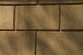 Brown gray texture of large bricks in the wall of the house Royalty Free Stock Photo