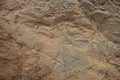 Brown gray rock texture. Stone background. Sandstone. Light brown rough background. Royalty Free Stock Photo