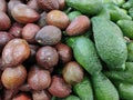 Brown and green avocado fruits