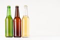 Brown, green, transparent longneck beer bottles 500ml, mock up. Template for advertising, design, branding identity on white wood