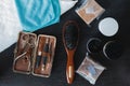 Brown hairbrush, manicure set, soap and hair styling gel Royalty Free Stock Photo