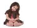 Brown Haired Young Child Tilting Her Head Sideways Royalty Free Stock Photo