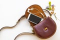 Brown hand bag leatherette collection of lifestyle fashion woman with mobile phone