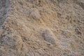 Brown heap of sand material for constructing