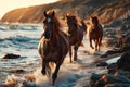 Brown horses running on a beach