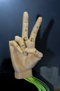 Brown human hand on 3d printed close-up. An object prototype Royalty Free Stock Photo