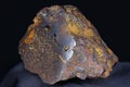 Brown iron ore close up, sample of hematite with limonite iron ore