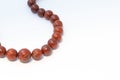 Brown jasper beads isolated on white background Royalty Free Stock Photo