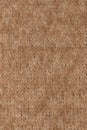 Brown knitted fabric as background Royalty Free Stock Photo