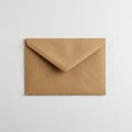Brown kraft paper envelope with a triangular flap placed on a plain white background Royalty Free Stock Photo