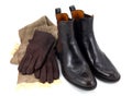 Brown leather boots with gloves and scarf Royalty Free Stock Photo