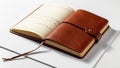 Brown leather bound notebook with an open page displaying handwriting Royalty Free Stock Photo