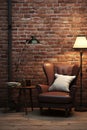 Brown leather chair on dark elegant brick wall texture background, lighting, quiet luxury concept Royalty Free Stock Photo