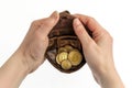 A brown leather coin purse that is filled with golden Bitcoins Royalty Free Stock Photo