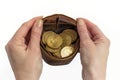 A brown leather coin purse that is filled with golden Bitcoins Royalty Free Stock Photo