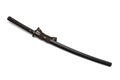 Brown leather cord tie on grip Japanese sword and black scabbard with steel fitting. Royalty Free Stock Photo