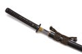 Brown leather cord tie on grip Japanese sword steel fitting and black scabbard Royalty Free Stock Photo