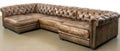 Brown leather couch with a checkered pattern Royalty Free Stock Photo