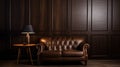 A brown leather couch sitting next to a wooden table Royalty Free Stock Photo