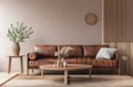 a brown leather couch and a table in a living room Royalty Free Stock Photo