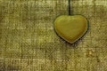 Brown leather heart on old natural material Royalty Free Stock Photo