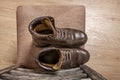 A brown leather hiking boot with triple stitching on an old seat viewed from the top Royalty Free Stock Photo