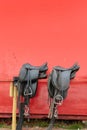 Brown leather horse saddles before the ride Royalty Free Stock Photo