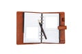 Brown leather journal with two empty polaroid frames and a brown-golden pen Royalty Free Stock Photo