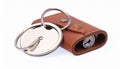 Brown leather key holder with silver key ring and car key insert image photo Royalty Free Stock Photo