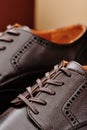 Brown leather men& x27;s shoes in classic style close-up Royalty Free Stock Photo