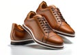 Brown leather pair of male shoes on white background. Generative AI Royalty Free Stock Photo