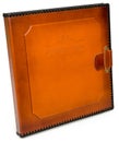 Brown leather photo album cover with decorative frame for text Royalty Free Stock Photo