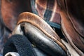Brown leather saddle and equestrian sport equipment and accessories Royalty Free Stock Photo
