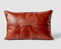 Brown leather sofa pillow with elegant stitched detailing Royalty Free Stock Photo