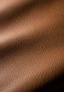 Brown leather texture with a subtle sheen, characterized by a series of fine, natural- Royalty Free Stock Photo